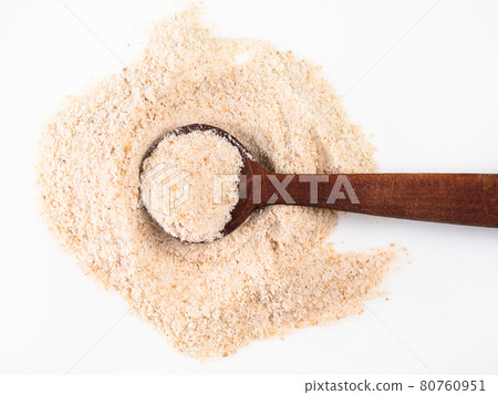 spoon on pile of ground asafoetida on white 80760951
