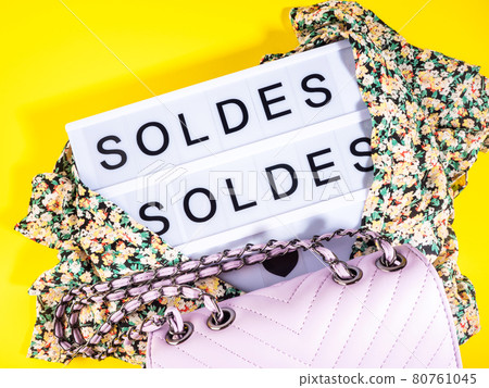 Fashion sale concept with lightbox Spanish text and floral shirt on yellow 80761045