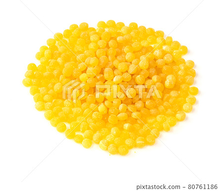 pile of uncooked ptitim closeup on white 80761186