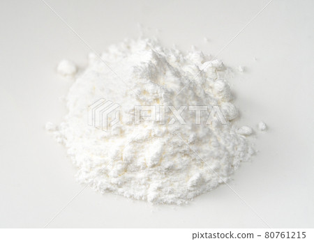 handful of baking powder closeup on white handful of baking powder closeup on white 80761215
