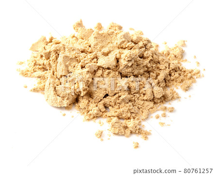 pile of ginger powder closeup on white pile of ginger powder closeup on white 80761257
