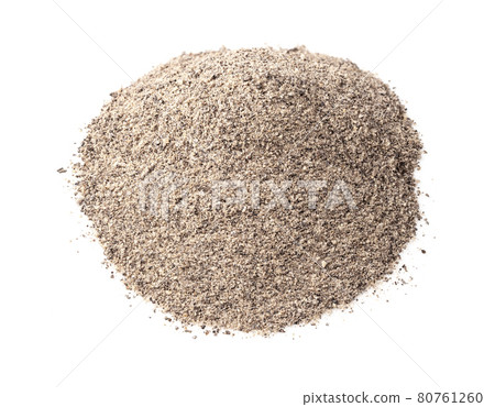pile of ground black pepper closeup on white pile of ground black pepper closeup on white 80761260