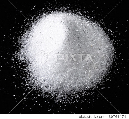 handful of crystalline erythritol on black 80761474