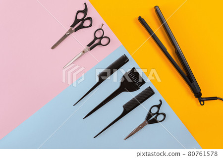 Hairdresser tools on a colored background with copy space Hairdresser tools on a colored background with copy space 80761578