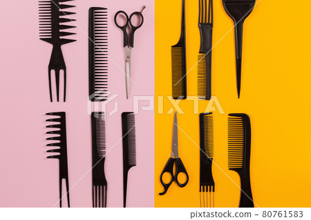 Hairdresser tools on pink and orange background with copy space Hairdresser tools on pink and orange background with copy space 80761583