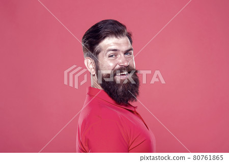 His long beard works well. Happy hipster red background. His long beard works well. Happy hipster red background. 80761865