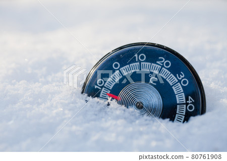 Snowed thermometer cold winter weather concept Snowed thermometer cold winter weather concept 80761908