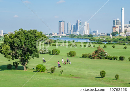 Golf course on the riverbed of the Tama River and the cityscape along the river Kawasaki City, Kanagawa Prefecture 80762368