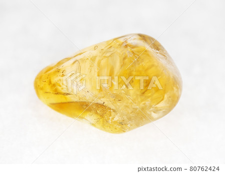 polished Citrine (yellow quartz) gem on white polished Citrine (yellow quartz) gem on white 80762424