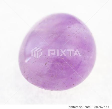 tumbled Amethyst (violet quartz) gem on white tumbled Amethyst (violet quartz) gem on white 80762434