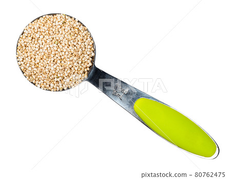 top view of quinoa seeds in measuring spoon cutout top view of quinoa seeds in measuring spoon cutout 80762475