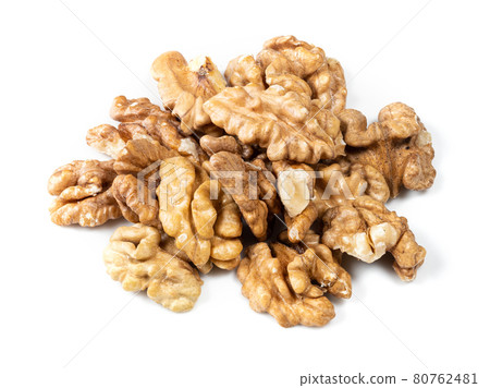 handful of shelled walnuts closeup on white handful of shelled walnuts closeup on white 80762481