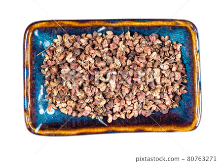 pink sichuan pepper on rectangular plate cutout 80763271