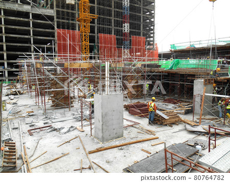 SELANGOR, MALAYSIA -AUGUST 17, 2016: Cast column with protruding reinforcement bar. Ready for next cast for next level. Under construction.  80764782