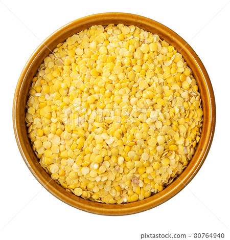 split yellow lentils in measuring cup cutout split yellow lentils in measuring cup cutout 80764940