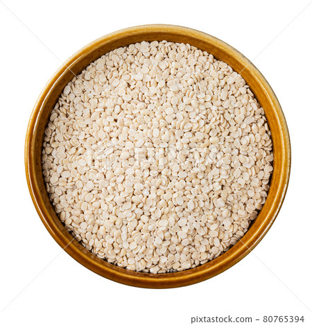 urad dal (split black gram) beans in bowl cutout 80765394