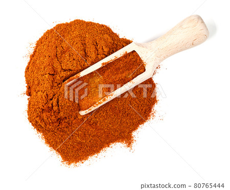 top view of scoop on cayenne pepper on white 80765444