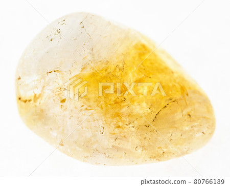 tumbled Citrine (yellow quartz) gem stone on white tumbled Citrine (yellow quartz) gem stone on white 80766189