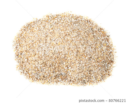 handful of rye bran closeup on white 80766221