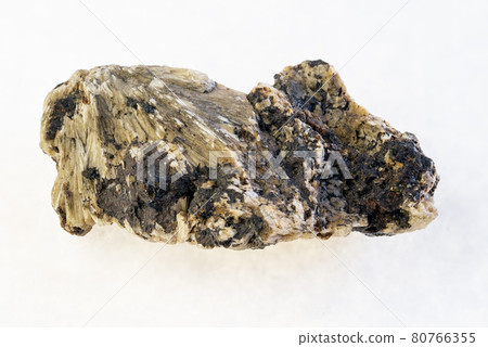 Perovskite in raw Clinochlore stone on white Perovskite in raw Clinochlore stone on white 80766355