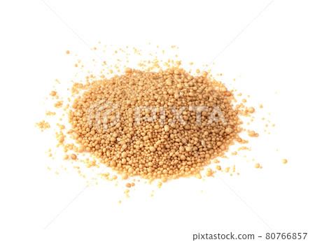 handful of granulated active dry yeast on white handful of granulated active dry yeast on white 80766857
