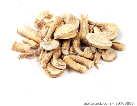 pile of dried parsley roots closeup on white 80766896