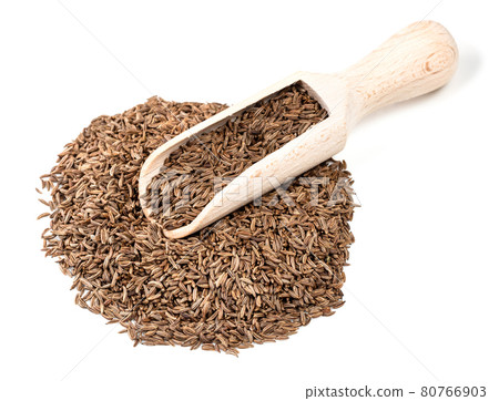 wooden scoop on pile of caraway fruits on white wooden scoop on pile of caraway fruits on white 80766903