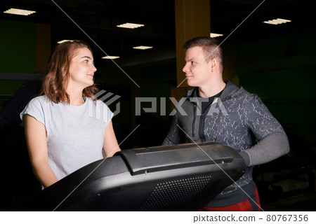 Workout in the gym on a treadmill. Workout in the gym on a treadmill. 80767356