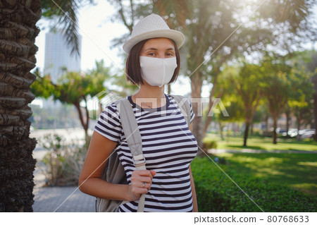 young stylish hipster Asia woman walking on the street young stylish hipster Asia woman walking on the street 80768633