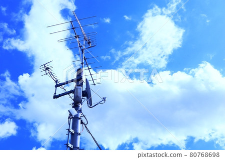 Beautiful blue sky, clouds, utility poles, and electric wires Beautiful blue sky, clouds, utility poles, and electric wires 80768698
