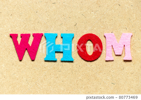 Color cloth alphabet letter in word whom on wood background 80773469