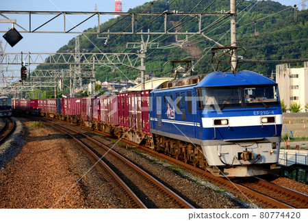 EF210-4 container freight train going on the Tokaido main line 80774420