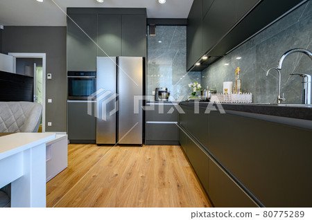 Modern large luxury dark gray kitchen Modern large luxury dark gray kitchen 80775289