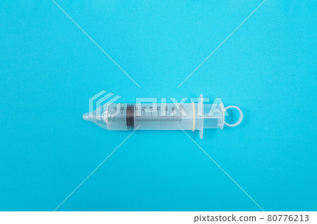 Anti Vaccination Concept - Syringe in a Condom 80776213