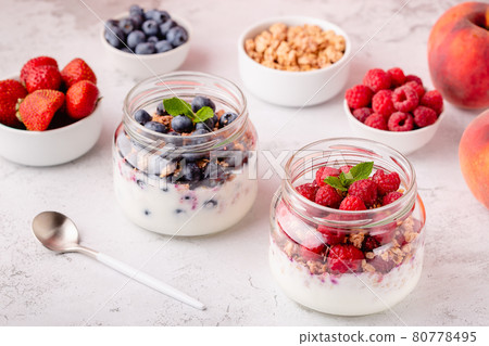 Healthy breakfast. Granola / muesli yoghurt and fruit. Healthy breakfast. Granola / muesli yoghurt and fruit. 80778495
