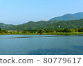 Mountains of Kyoto seen from Hirosawa Pond 80779617