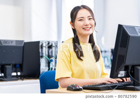 Young woman studying in a computer classroom Photographing cooperation: Japanese language school attached to Chuo Institute of Technology 80782590