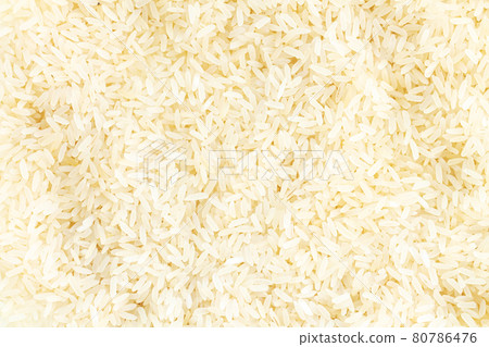 Raw white organic basmati rice background 80786476