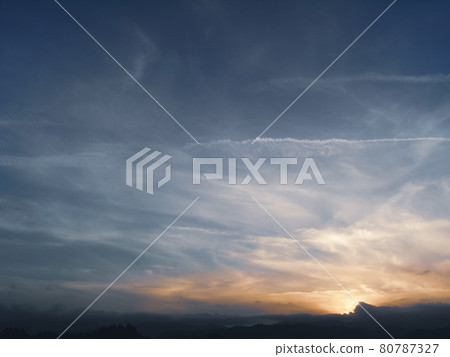 Sunset sky and airplane cloud 80787327