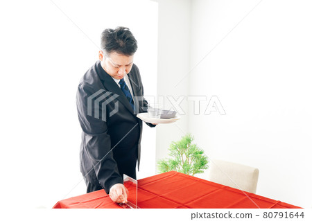 Hotel staff preparing for dining Hotel staff preparing for dining 80791644