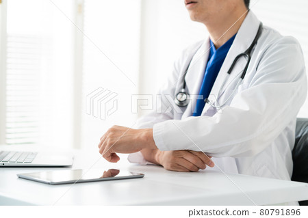 Doctor middle man white coat scrub medical examination at hand 80791896