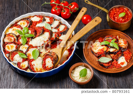 eggplant parmigiana in a baking dish, top view 80793161