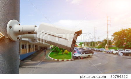 Security camera installed on the pole to monitor and to provide safety in the area 80794832