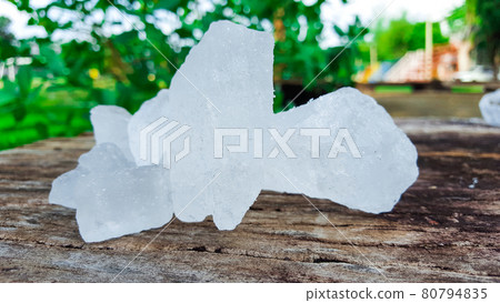 Alum on wood plank. Concept for body deodourant and vegetable preservation 80794835