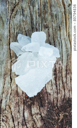 Alum on wood plank. Concept for body deodourant and vegetable preservation 80794836