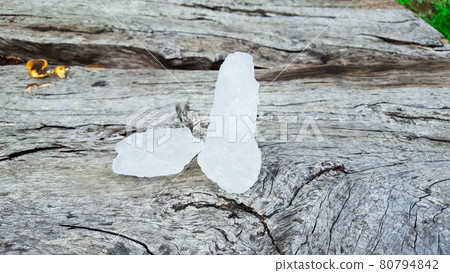 Alum on wood plank. Concept for body deodourant and vegetable preservation 80794842