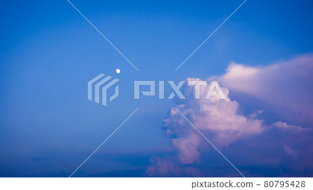 Moon at dusk and cumulonimbus [mysterious scenery] 80795428