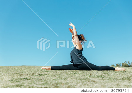 Open legs, stretching, yoga, classical ballet Open legs, stretching, yoga, classical ballet 80795734