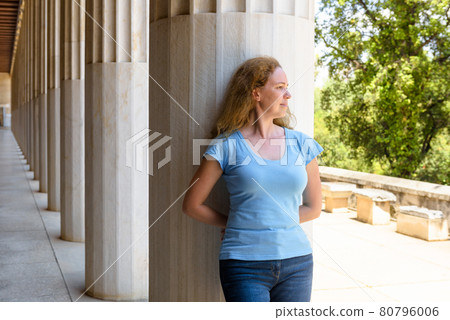 Young pretty woman visits Stoa of Attalos, Athens, Greece, Europe 80796006