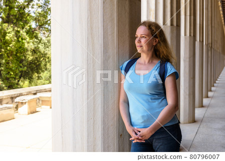 Female tourist visits Stoa of Attalos, Athens, Greece, Europe 80796007